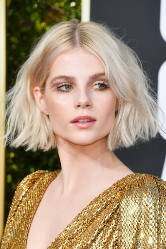 Image of a girl with short layered hair. Taken from Getty Images