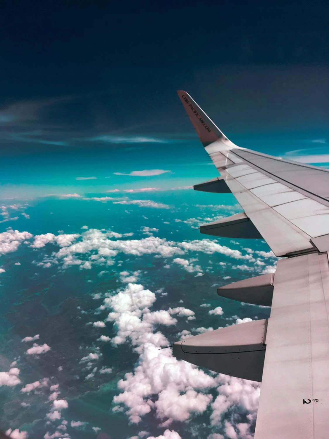 Image of a plane with a view over the sky. Taken from Pexels