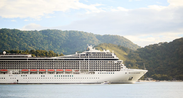 Image of a large cruise ship on water.