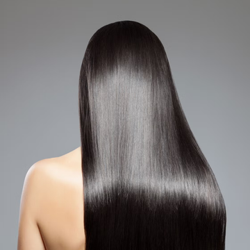 Image of a girl's hair from behind after a Keratin treatment. 