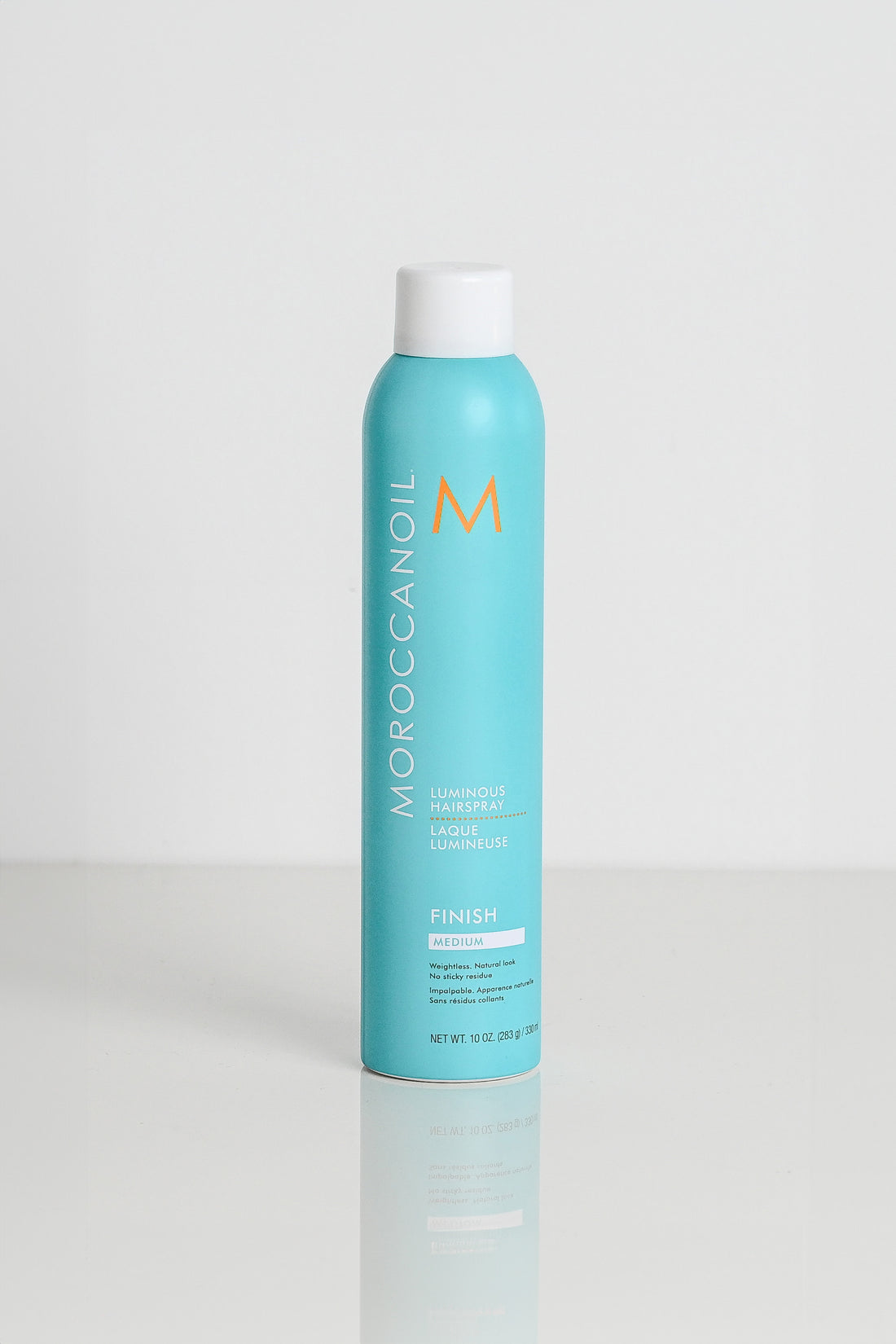 Turquiose bottle of Moroccanoil hydrating shampoo